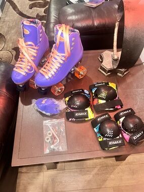 Purple Roller Skates with Orange Glitter Wheels and Pink Laces